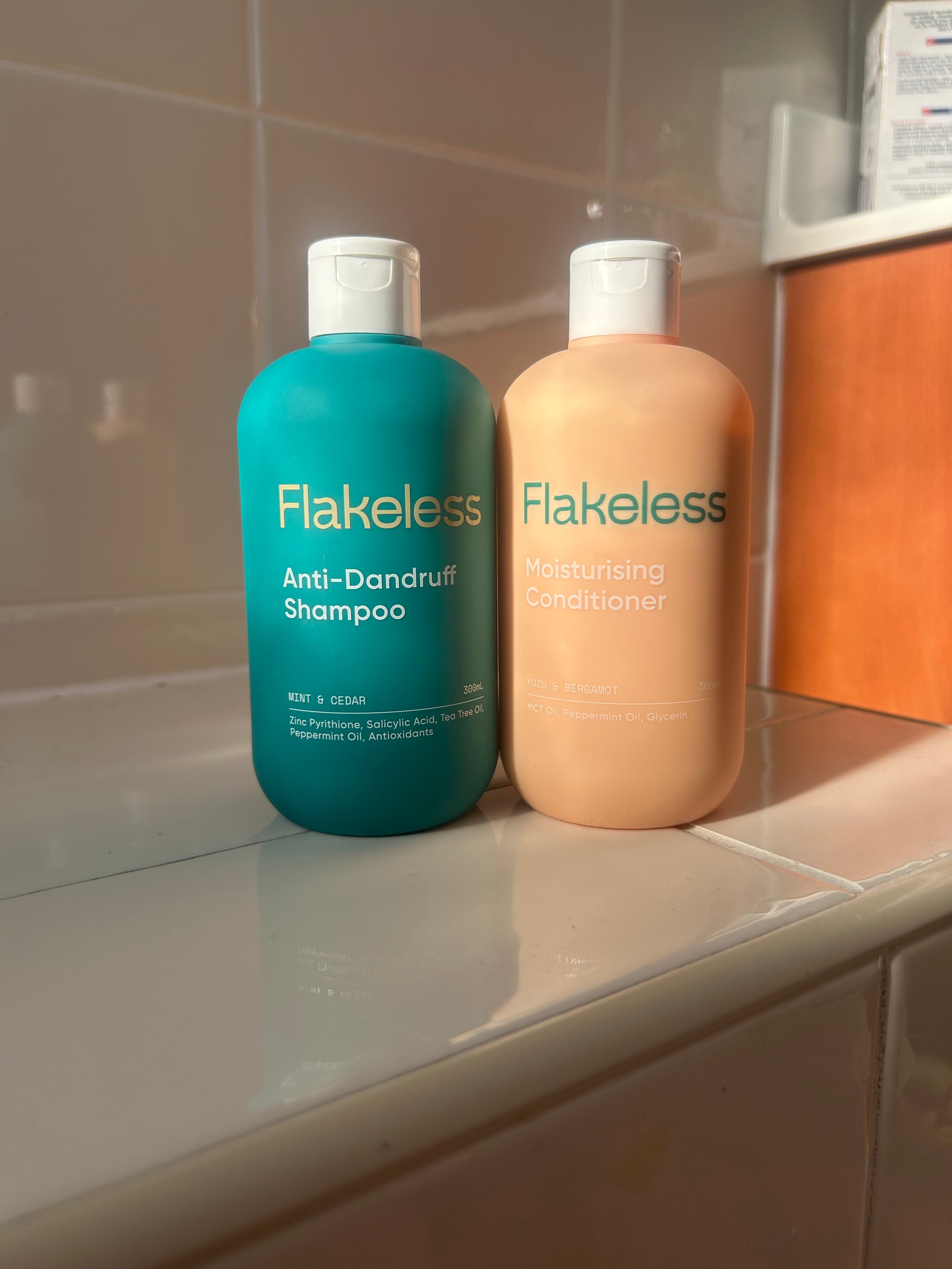 Customer using Flakeless shampoo